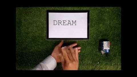 Transparent and attachable ionic communicators based on self-cleanable triboelectric nanogenerators