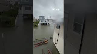 Floodwater RUSHES through coastal New Jersey neighborhood #flood #shorts #newjersey #usa Update