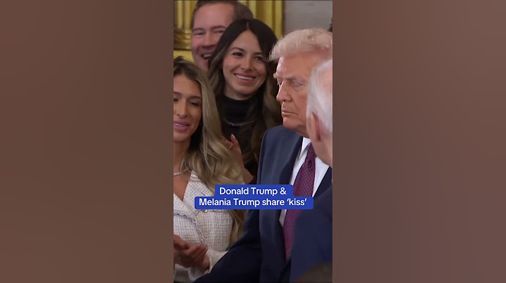 Donald Trump and Melania Trump share 'kiss' at inauguration