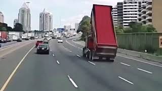 Toronto dump truck crash hits overhead sign on 401