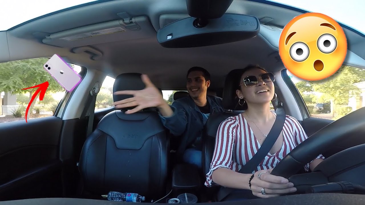 THROWING MY WIFES PHONE OUT THE CAR WINDOW! *PRANK* YouTube