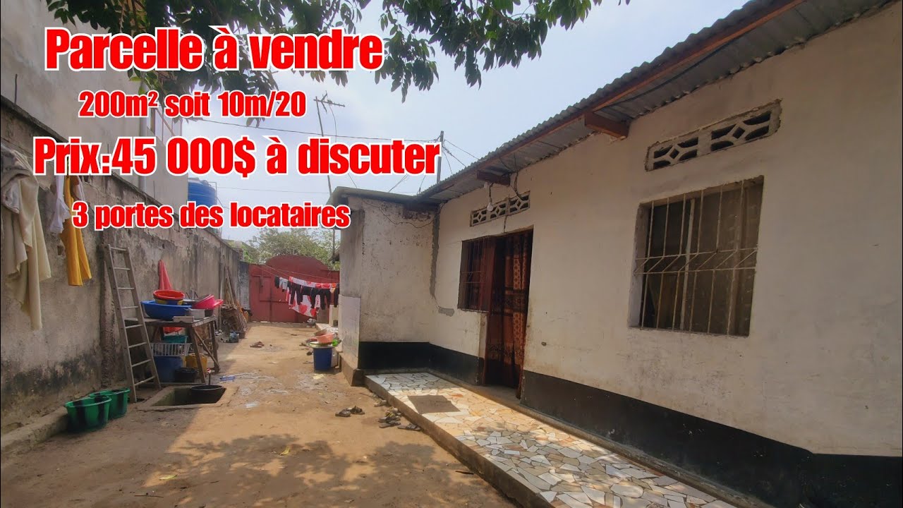 👉RDC/KINSHASA:PRIX=45 000$ À DISCUTER ARCELLE MISE EN VENTE AVEC 3 PORTES OU DES APPARTEMENTS 