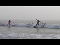 These Santas don't use sleighs... they surf!