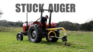 How to release an stuck auger