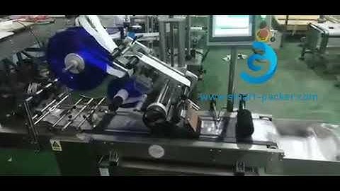 Automatic empty bag paging feeding top labeling machine testing video
