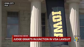Judge issues preliminary injunction to prevent the deportation of four people with ties to Univ....