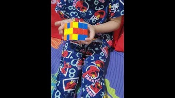 My 3-year old boy doing the DONUT 3X3 Rubik
