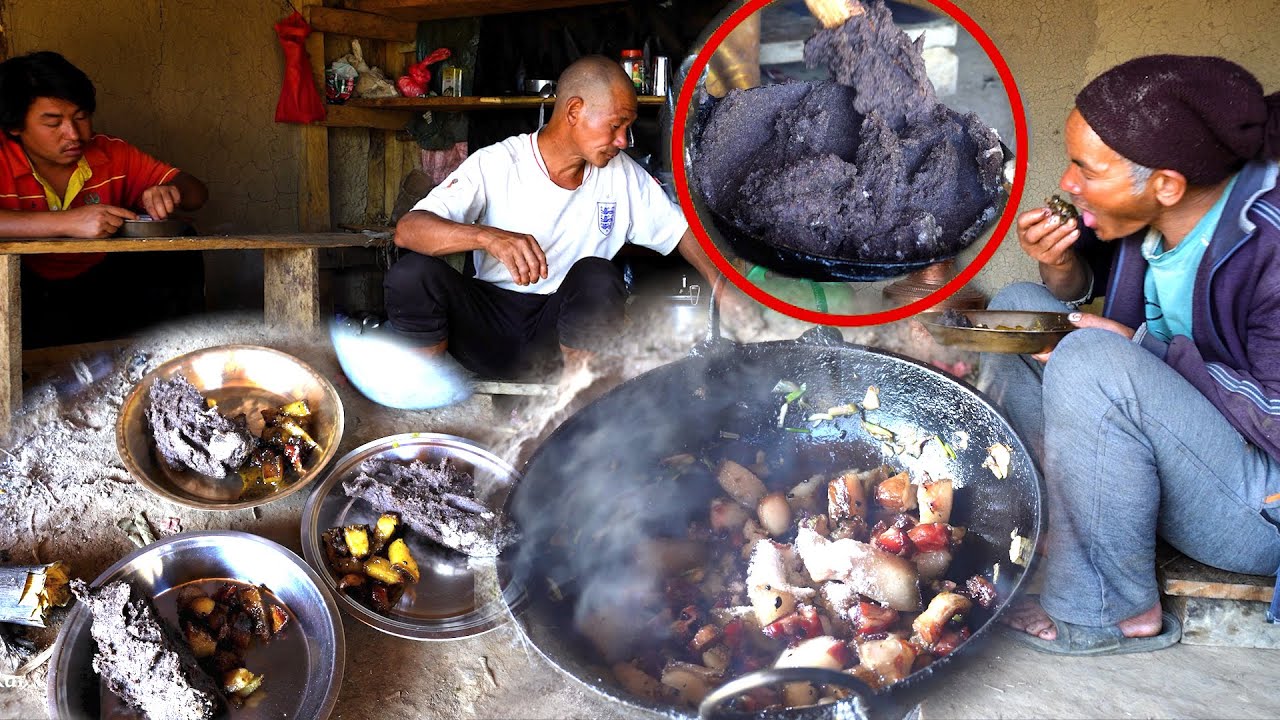 Dhido Ancient food of Nepal with pork curry Millet flour rice