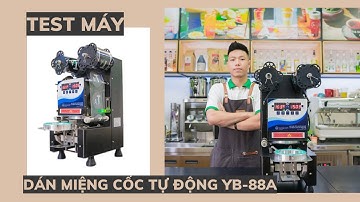 Khách hàng siêu thị Hải Minh test máy dán miệng cốc tự động YB 88A