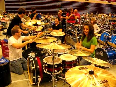 Alyssa Worth and Josh "Shorty" Ingram playing drum...