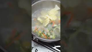 Cozy Camper Van Cooking: Seafood Noodles by Wood Stove! #shorts