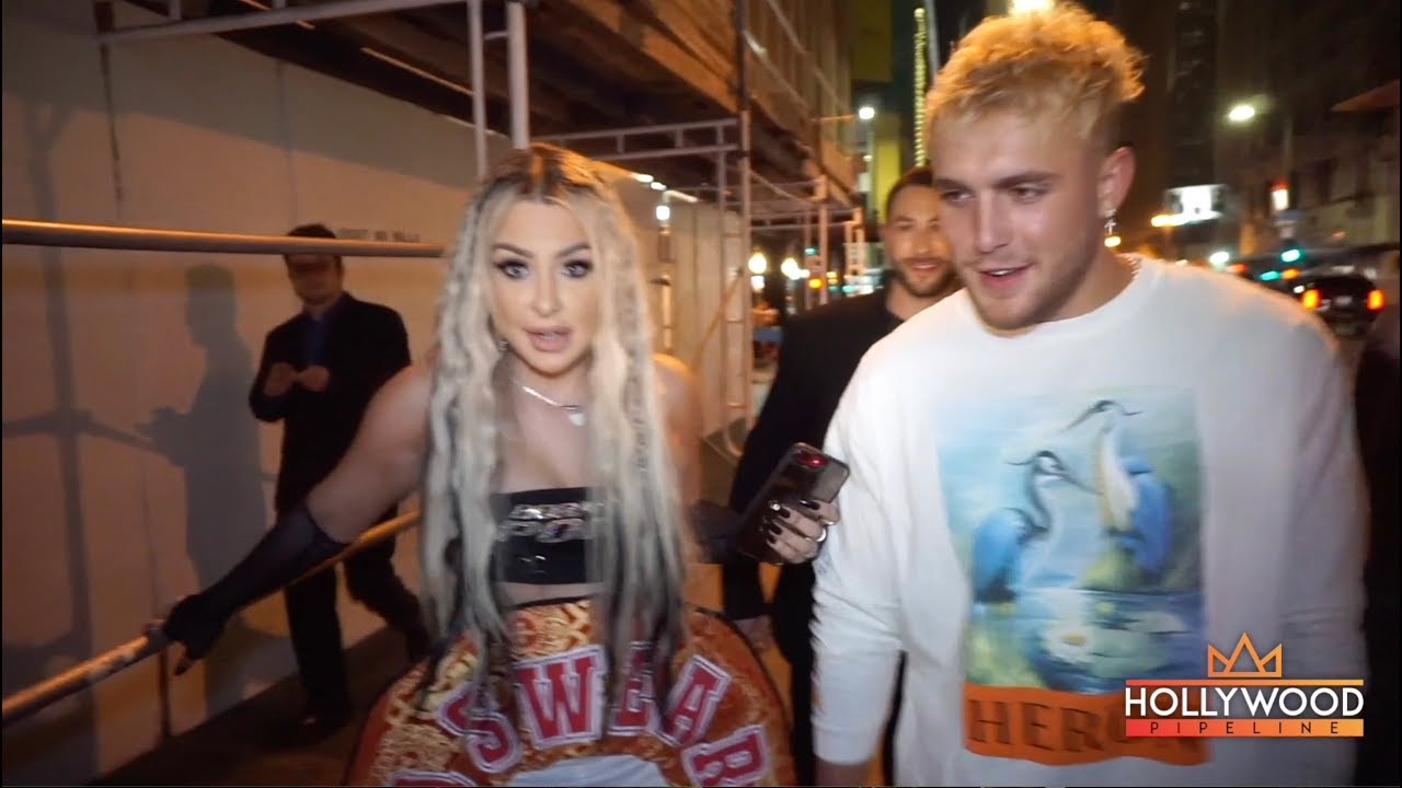 Tana Mongeau and Jake Paul support Bella Thorne at the Porn Hub awards. 