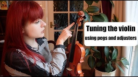 Tuning the violin with pegs and adjusters