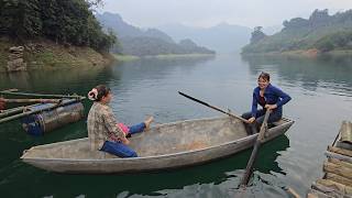 The two girls built a floating island on the lake.