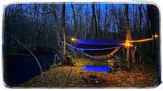 Spring Hammock Camping Next To A River In The Forest