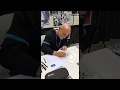 Artist Claudio Castellini drawing at C2E2 Chicago 2020