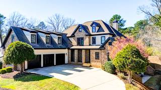 Inside this 7200 SQFT Traditional Home w/ Finished Basement & A Luxury Patio w/ a Hot Tub
