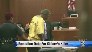 Execution date set for officer's killer