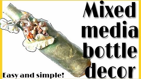 Mixed media altered bottle