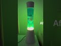 Lava lamp blue liquid green wax white base