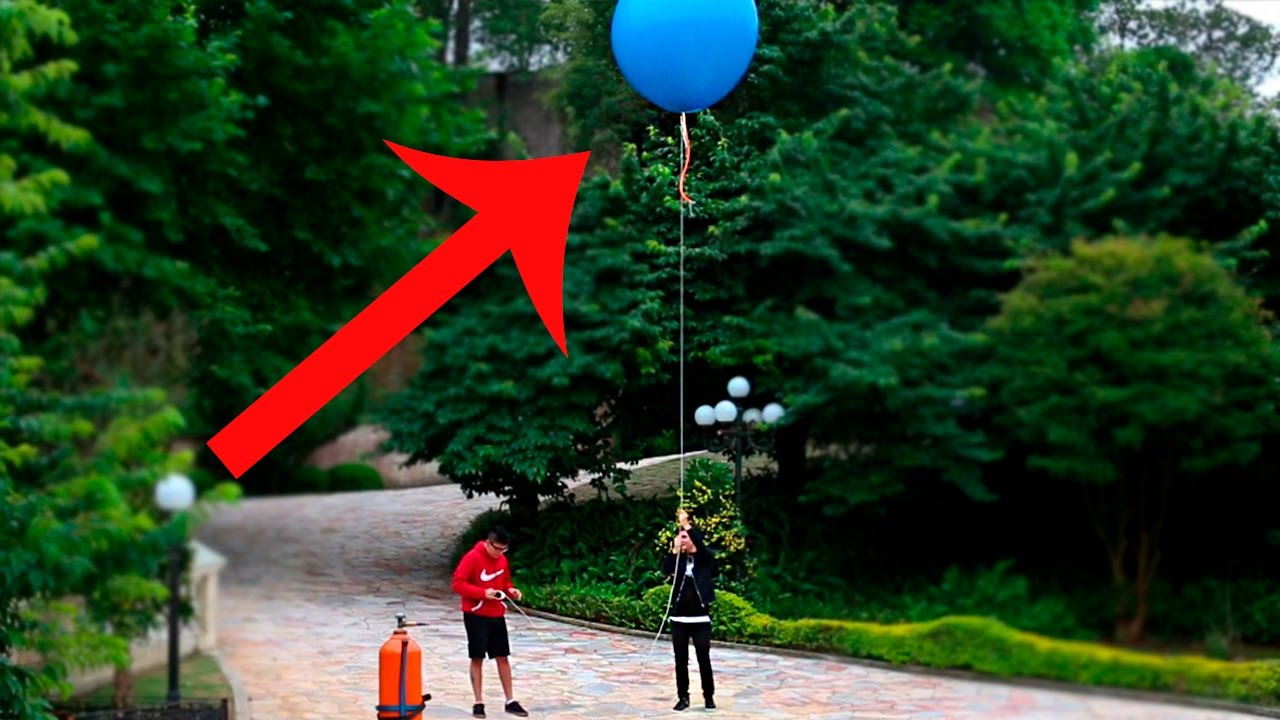 ENCHENDO A BEXIGA GIGANTE COM GÁS HÉLIO!