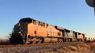 UP 7700 leads a Westbound K stack train with a CSX duo!