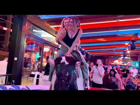 Two Funny Girls Riding on a Bull in Benidorm | Bull Riding 4K