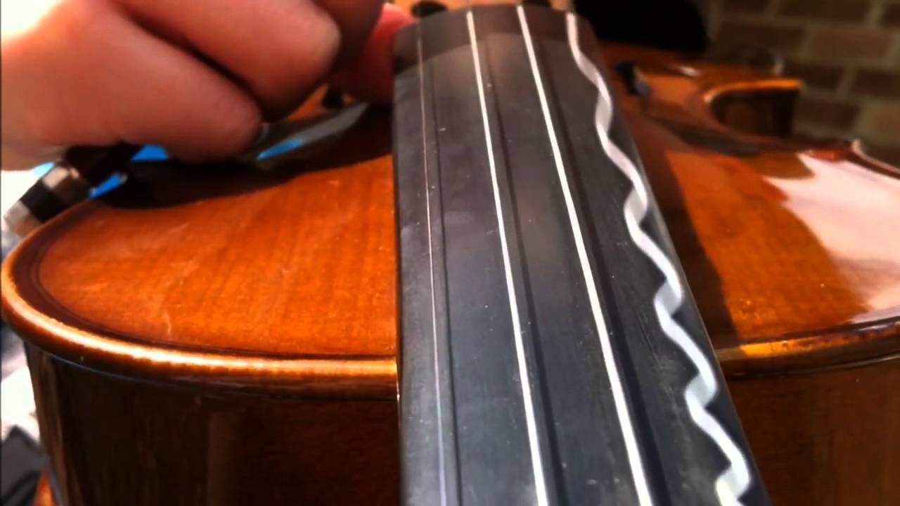 Vibrations of strings on a digital camera - YouTube