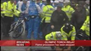 Clashes mar Olympic torch relay:London