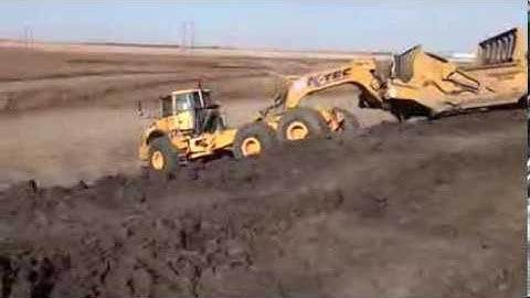 Volvo A40E Pulling K-Tec 1233ADT Scraper - Articulation and Ground Clearance