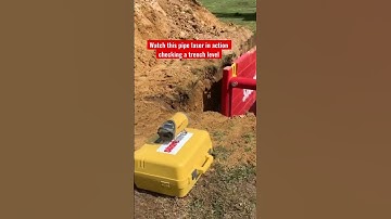 Pipe laser checking a trench box grade