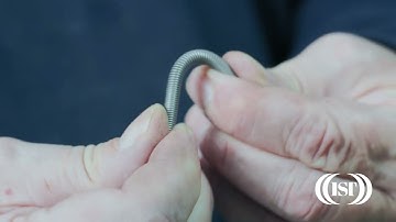 Measuring initial tension of extension springs