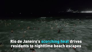 Rio de Janeiro’s scorching heat drives residents to nighttime beach escapes