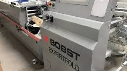 BOBST Folder Gluer EXPERTFOLD producing 4-corner boxes @ 29,000 boxes per hr.
