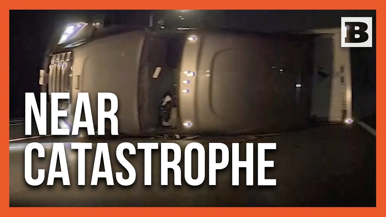 Drivers Narrowly Dodge Semi Truck Blown Over By Fierce Winds On drivers-narrowly-dodge-semi-truck-blown-over-by-fierce-winds-on