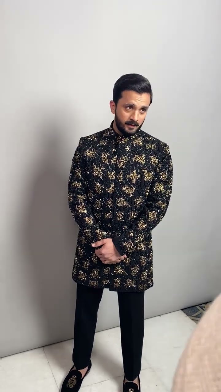 Rajab Butt steals the spotlight backstage at the 22nd NEO HUM Bridal Couture Week. ?✨”