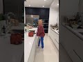 Taylor catching a grape that David throws
