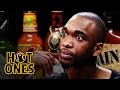 Jay Pharoah Has a Staring Contest While Eating Spicy Wings