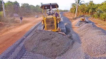 Perfect start up process of road base construction with crushed stone pushing Komatsu Dozer D41A