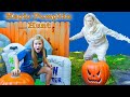 Assistant avoids the Silly Mummy for Magic Pumpkins In Halloween Town