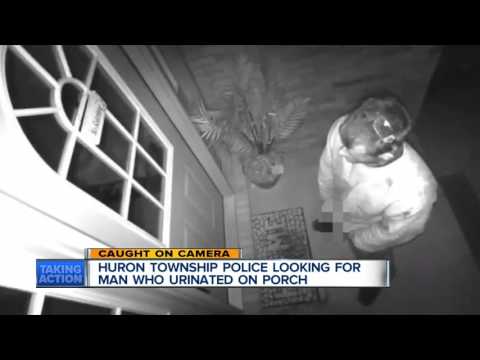 Man caught on camera urinating on front porch