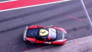 Some Ferrari F430 passing by the finish line. Insane sound!!!. Pump up the volume!!!