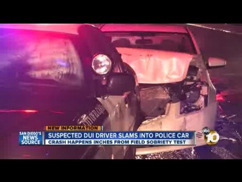 Suspected DUI driver crashes into police car - YouTube