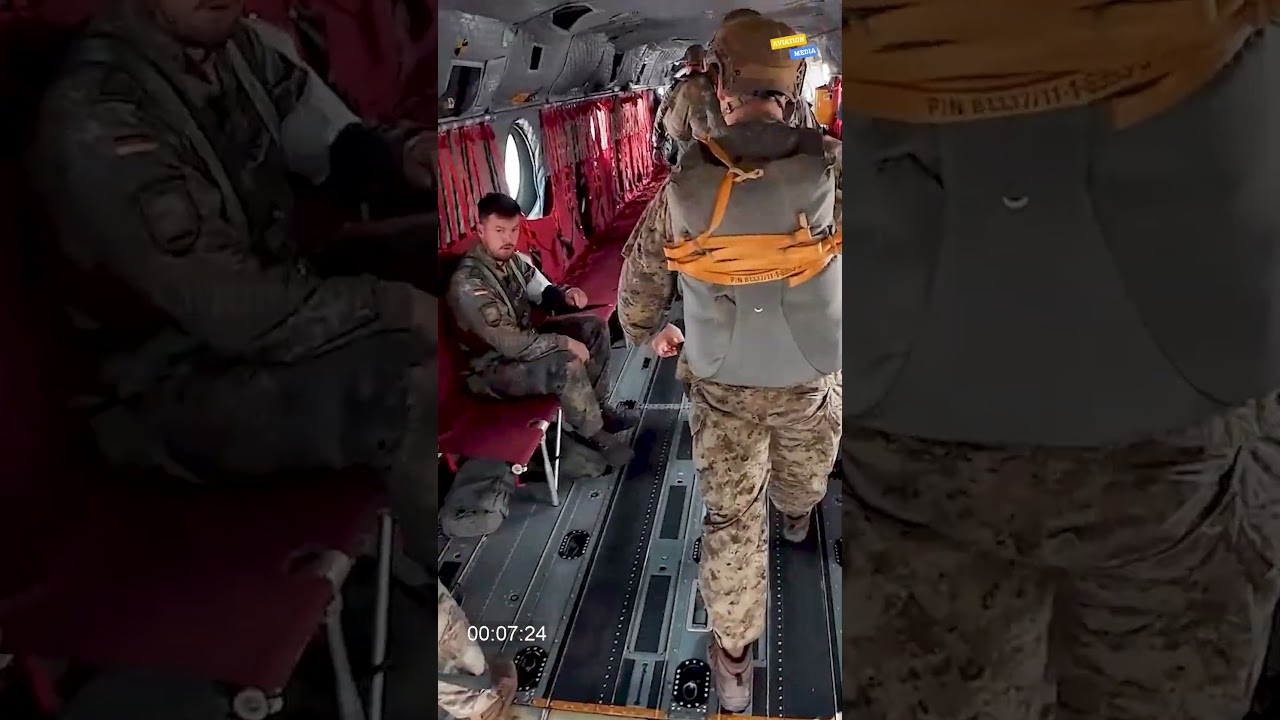 US Army parachutes using their MC-6 parachutes from a Ch-47 Chinook Helicopter