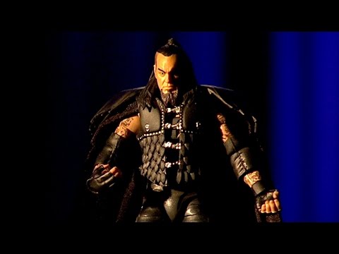 Howard Finkel unboxes Mattel’s Defining Moments Undertaker action figure