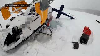 A helicopter crashed upside down in a frozen lake — and the pilot survived