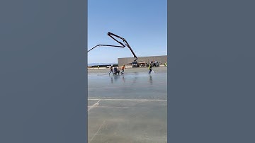 Concrete curing compound application. Chemically active tilt up cure bond breaker