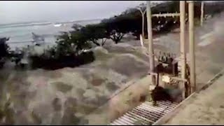 Indonesia earthquake: tsunami seen in terrifying footage crashing into
island with huge wave. video shows massive waves an i...
