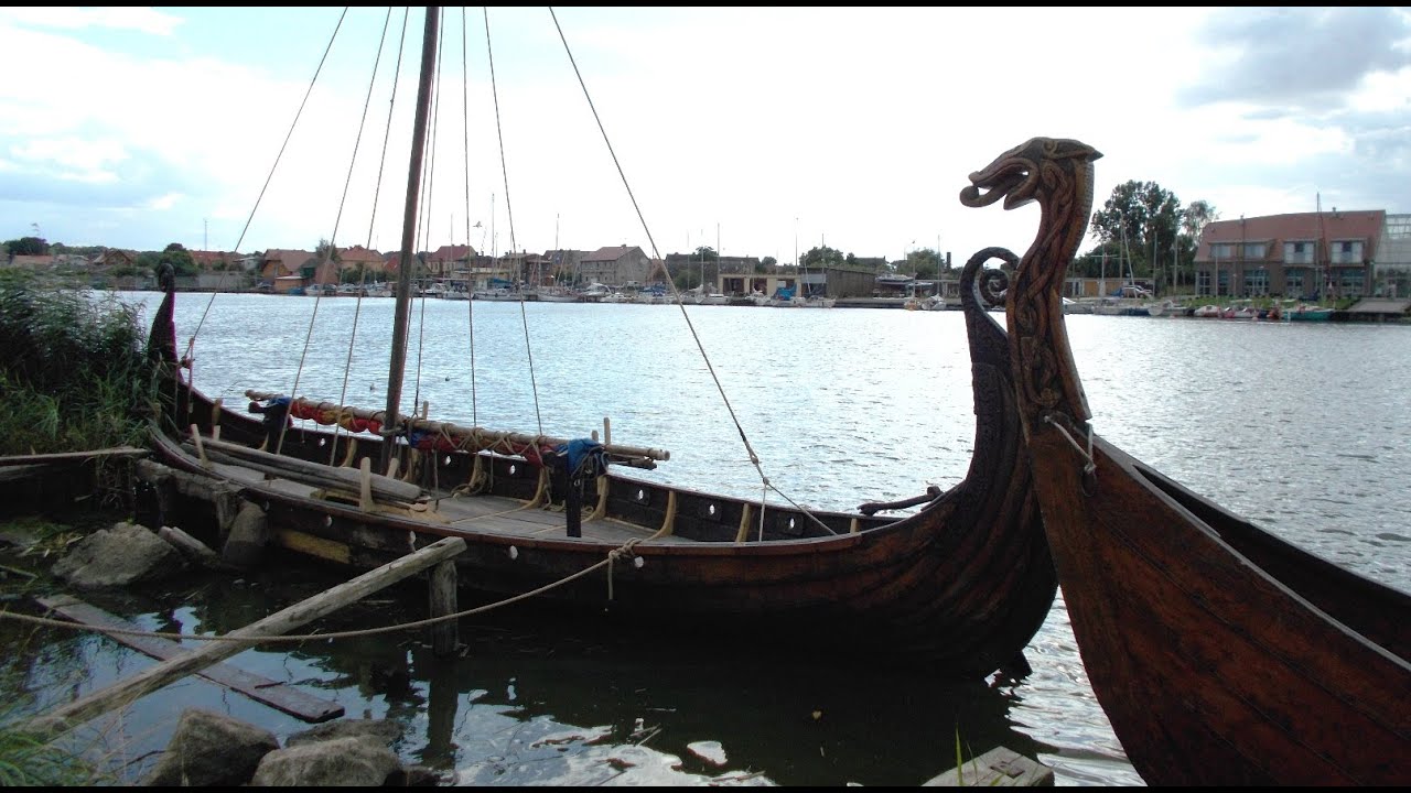 Viking ships rowing to shore YouTube