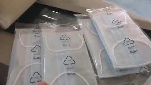 Automatic face mask flow wrapping packaging machine